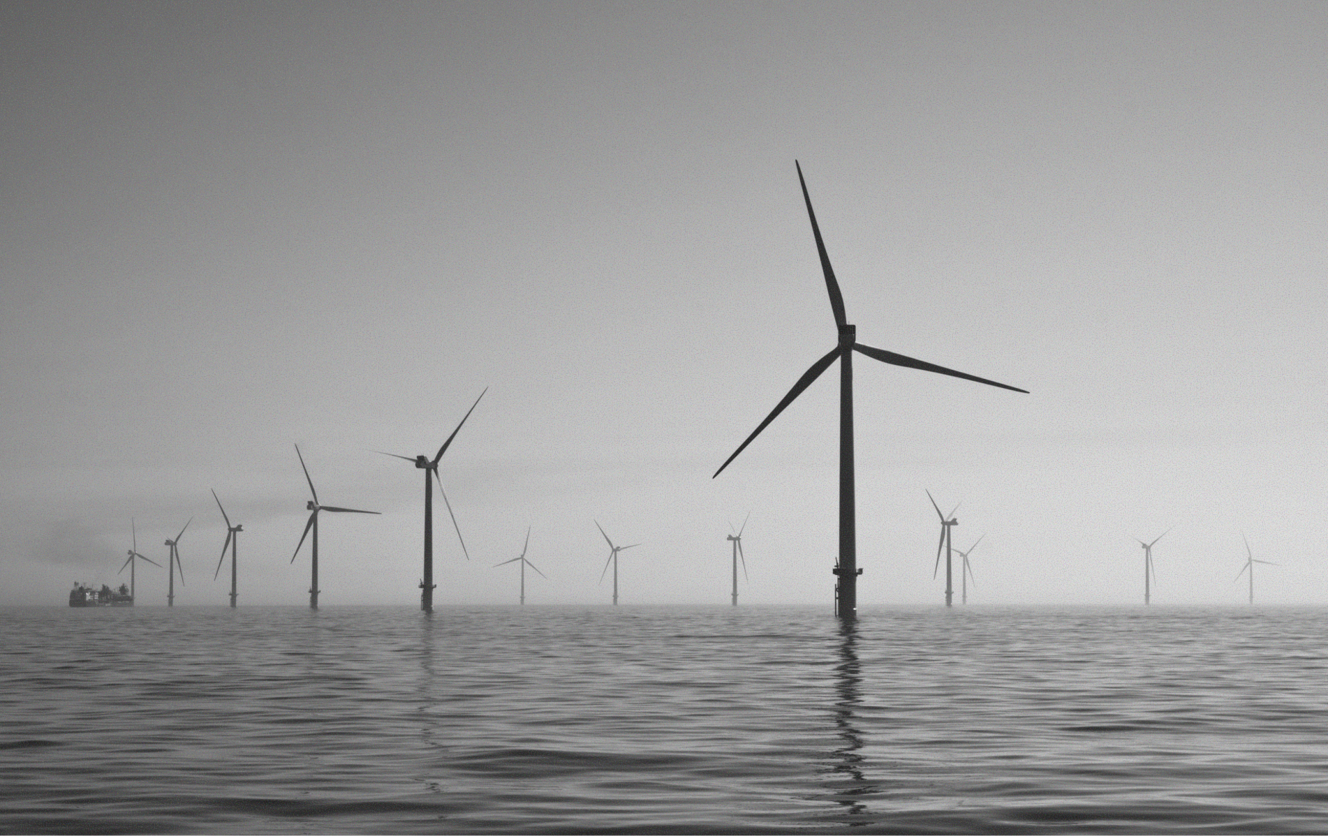 Large windmills in the ocean.